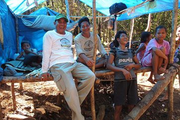 Donatus Rantan with fellow Dayaks in the forest.