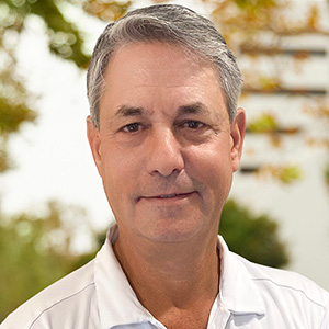 Headshot of John Simon