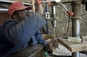 Justin Kato, one of Wonder Welder's first employees, started as a welder in 2004; now he works in the woodshop.