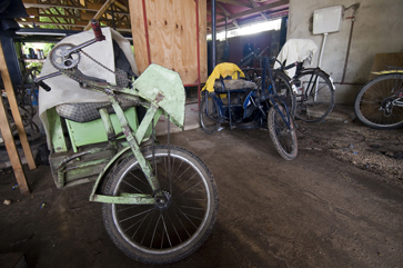 The employee parking lot for donated hand-pedal carts at Wonder Welders.
