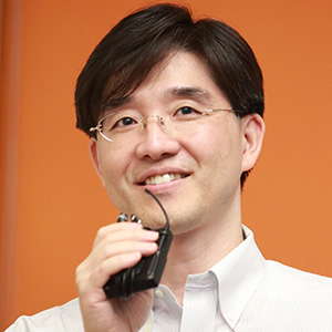 Headshot of Hyun Shin