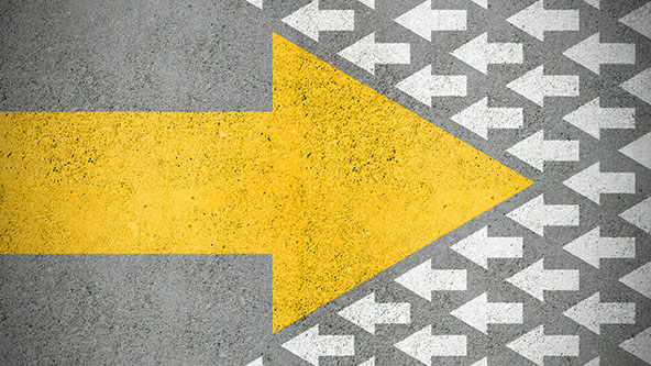 Large yellow arrow against smaller white ones