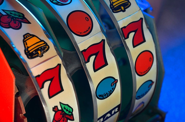 A close-up view of an old slot machine winning numbers.