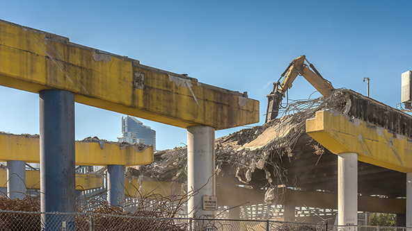 Heavy machinery next to a construction site