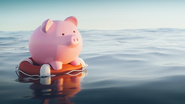 piggy bank on a lifebuoy