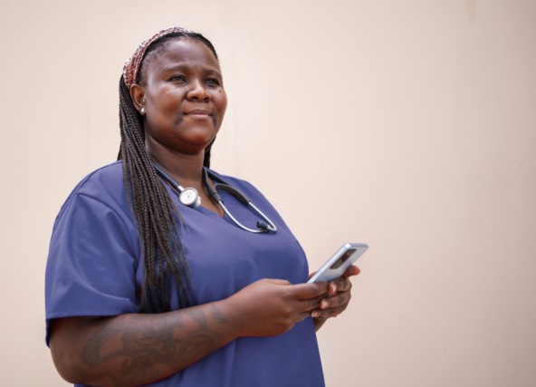 nurse holding a phone