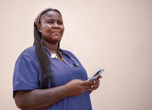 nurse holding a phone