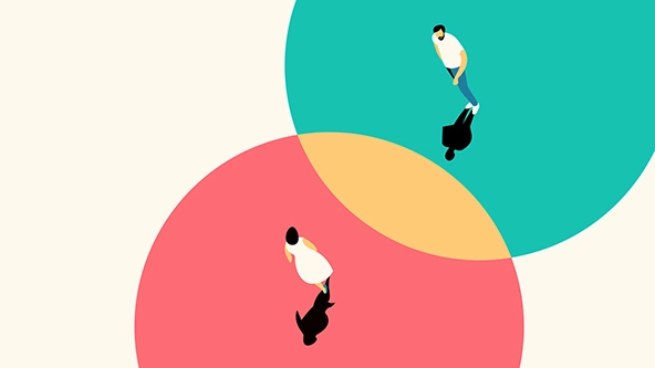 Two people walking in different circles that overlap with each other