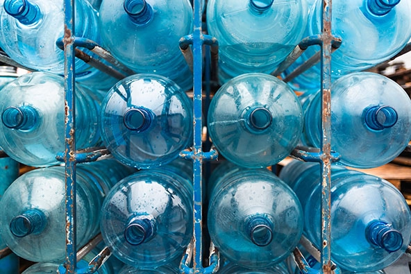 water jugs arranged in warehouse