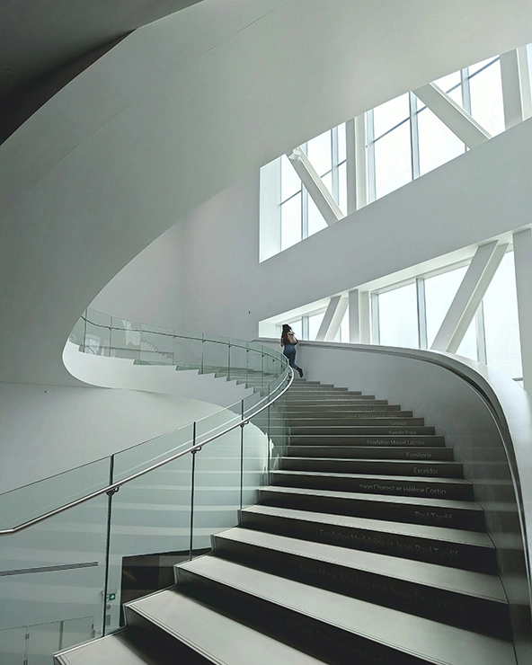 person walking up a staircase