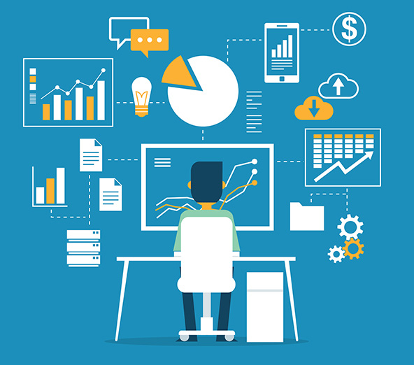 Person sitting at a desk looking at a screen with line graphs; background of other charts and graphs