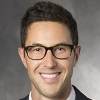 Joshua_Romisher_SSIR_headshot_Sloan