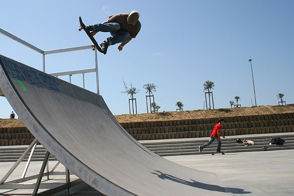 Man jumps with a skateboard