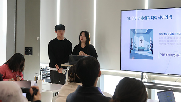 two people standing at a podium