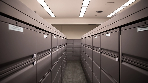 looking down a row of filing cabinets