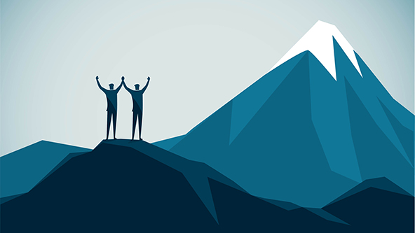 two figures holding raised hands looking at mountain top