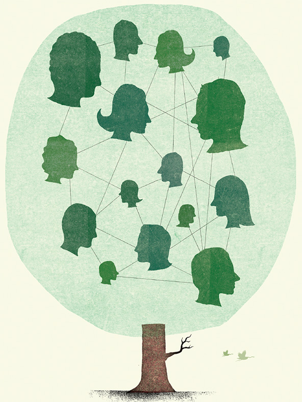 Silhouettes of faces in a tree.