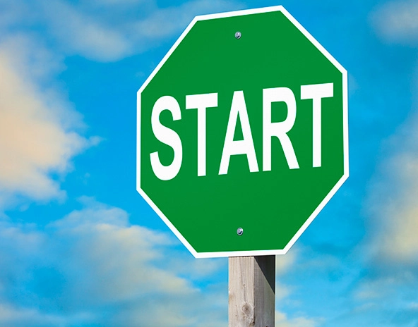 A green Start Sign, the (much more positive) opposite of a stop sign