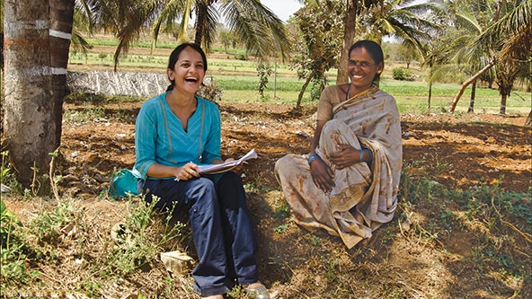 Two women sitting outside