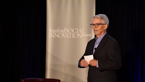 SSIR Editor-in-Chief Eric Nee speaking to an audience at the Nonprofit Management Institute