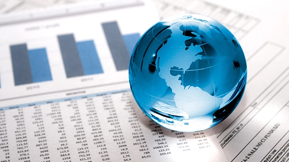 Glass globe with North America and business papers